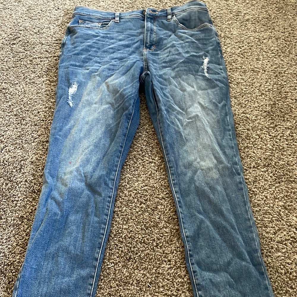 Slightly distressed jeans, lightly worn